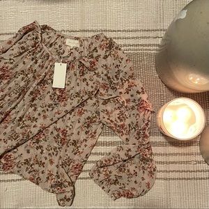 Mellóday Women’s top size small. New with tags!